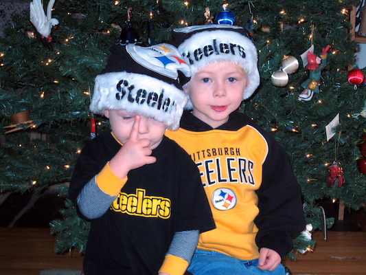 Tim and Cole in front of the tree (12-02-2007 08:43)