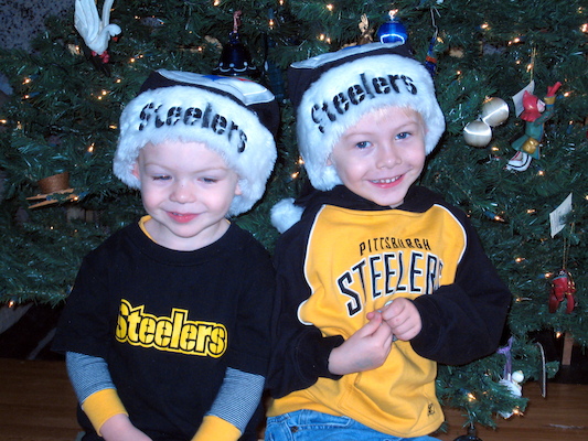 Tim and Cole in front of the tree (12-02-2007 08:43)