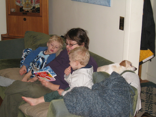 Mommy reading to Tim and Cole, Emily napping (12-13-2007 18:50)