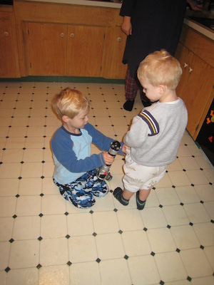 Tim bestowing the Light Saber on Cole (12-25-2007 06:50)