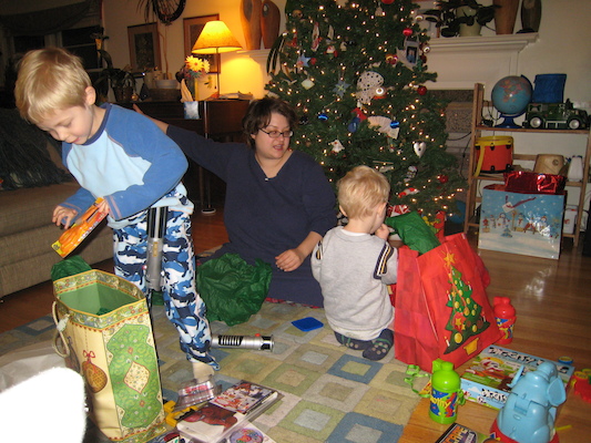 Tim, Christine and Cole open presents (12-25-2007 06:53)
