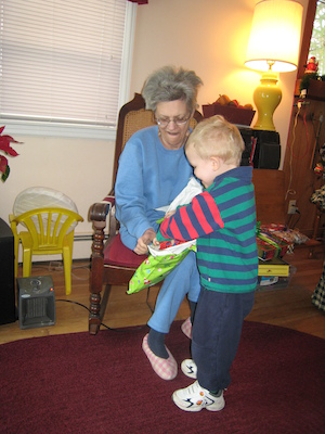 Nea and Cole open a present (12-25-2007 10:25)