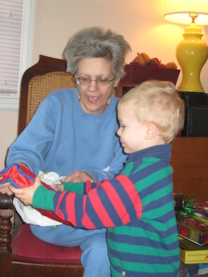 Nea and Cole open a present (12-25-2007 10:25)