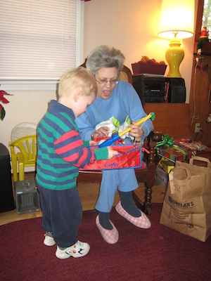 Cole and Nea open a present (12-25-2007 10:26)