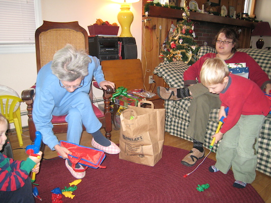 Cole, Nea, Mommy and Tim fishing (12-25-2007 10:26)