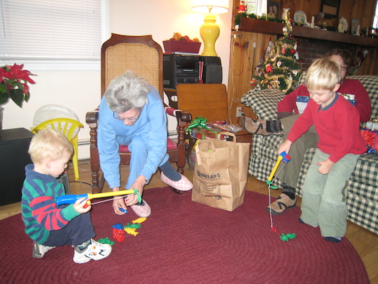 Cole, Nea, Mommy and Tim fishing (12-25-2007 10:26)