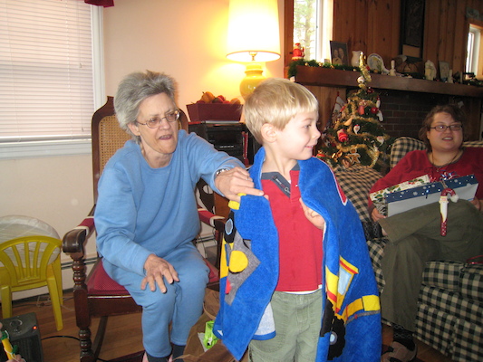 Nea enrobing Tim in his truck towel (12-25-2007 10:28)