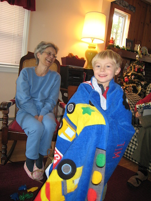 Nea enrobing Tim in his truck towel (12-25-2007 10:29)