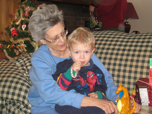 Nea cuddling Cole (12-25-2007 12:03)