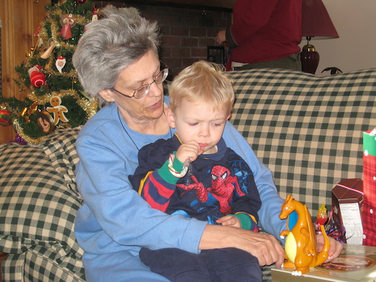 Nea cuddling Cole (12-25-2007 12:03)