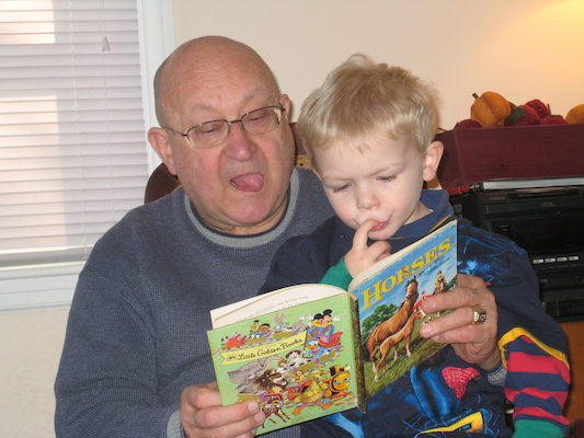 Poppy reading to Cole (12-25-2007 12:24)