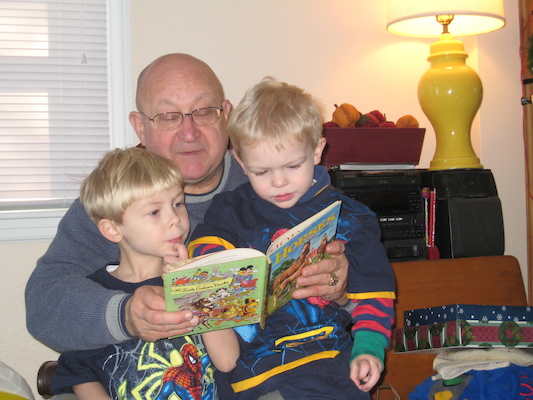 Poppy reading to Tim and Cole (12-25-2007 12:25)