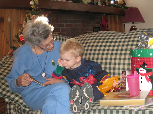 Nea reading to Cole (12-25-2007 12:35)