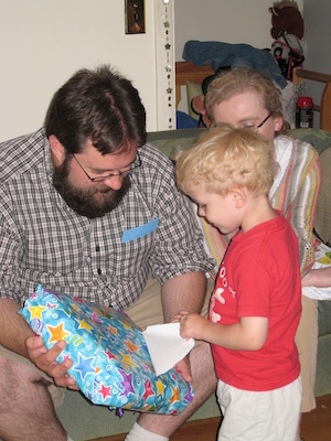 Juj, Cole and Marie opening presents (06-15-2008 17:33)