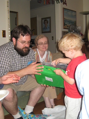 Juj, Marie and Cole opening presents (06-15-2008 17:33)