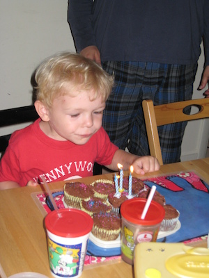 Cole blowing out candles (06-15-2008 17:43)