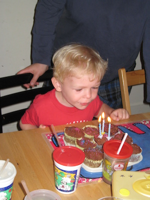 Cole blowing out candles (06-15-2008 17:43)