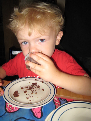 Cole devouring a cupcake (06-15-2008 17:48)