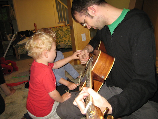 Cole playing guitar with Aron (06-15-2008 18:52)