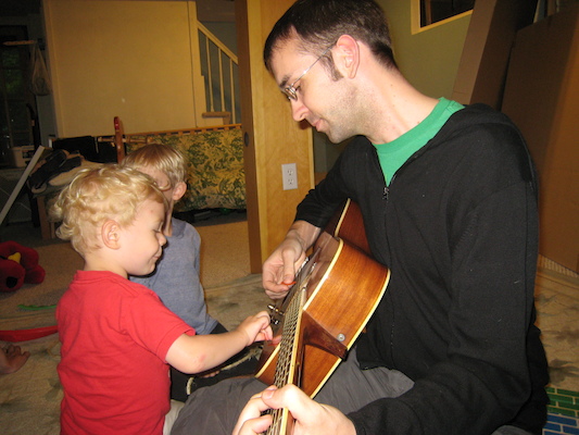 Cole playing guitar with Aron (06-15-2008 18:52)