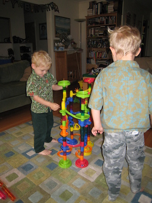 Cole and Tim playing with the marble run (06-16-2008 07:09)