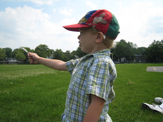 Cole with a feather (07-26-2008 10:31)