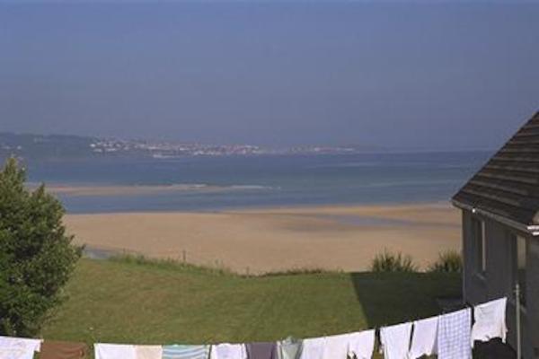 Our house, laundry and the sea