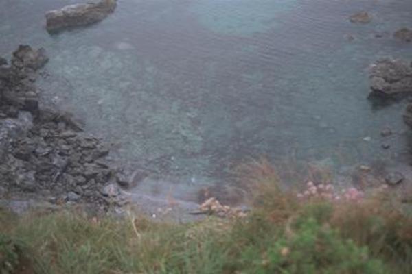 Looking over the clif to the sea