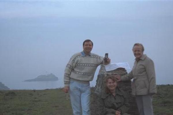 Dad, his GPS and Mum at a surveying landmark