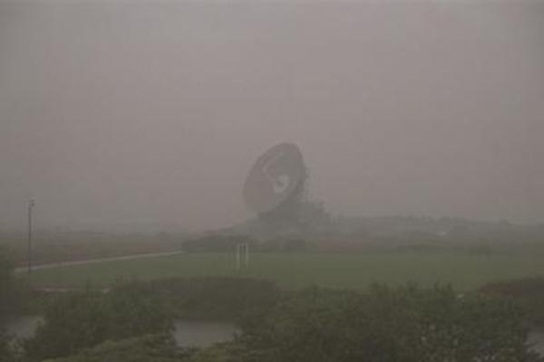 Satelite dishes in the mist