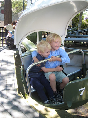 Tim and Cole in a helicopter cuddling (08-27-2008 12:29)
