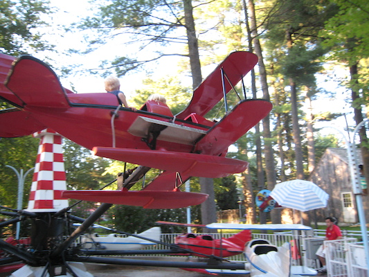 Tim and Cole flying a plane (08-27-2008 17:36)