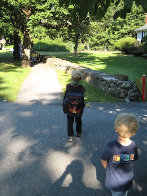Tim and Cole walking to the bus (09-03-2008 07:40)