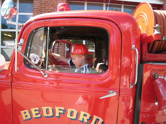 Tim and Cole in a firetruck (09-20-2008 10:23)