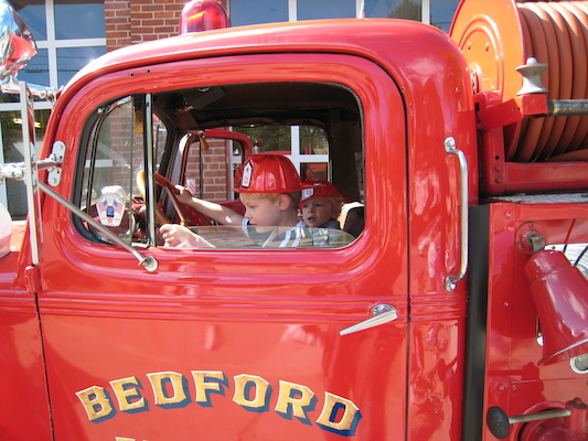 Tim and Cole in a firetruck (09-20-2008 10:23)