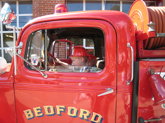 Tim and Cole in a firetruck (09-20-2008 10:23)