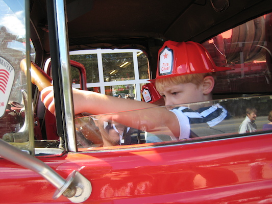 Tim and Cole in a firetruck (09-20-2008 10:23)