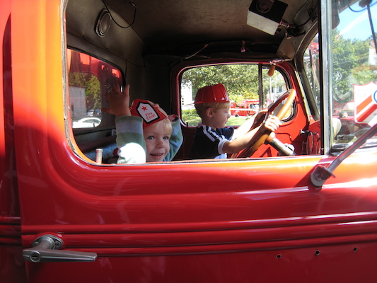 Tim and Cole in a firetruck (09-20-2008 10:23)