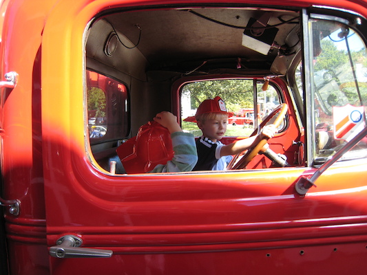 Tim and Cole in a firetruck (09-20-2008 10:23)