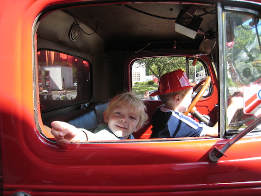 Tim and Cole in a firetruck (09-20-2008 10:23)