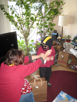 Mommy and Cole in Steelers helmet (12-25-2008 11:16)