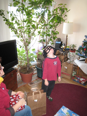 Mommy and Cole in Steelers helmet (12-25-2008 11:16)