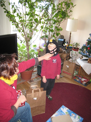Mommy and Cole in Steelers helmet (12-25-2008 11:16)