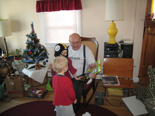 Cole, Tim and Poppy with presents (12-25-2008 11:16)