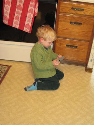 Cole examining the camera (Tim pic) (02-15-2009 14:38)