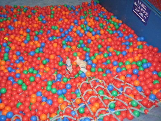 Cole in the ball pit, post slide (07-11-2009 11:00)