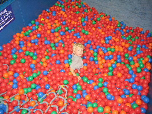 Cole in the ball pit, post slide (07-11-2009 11:00)