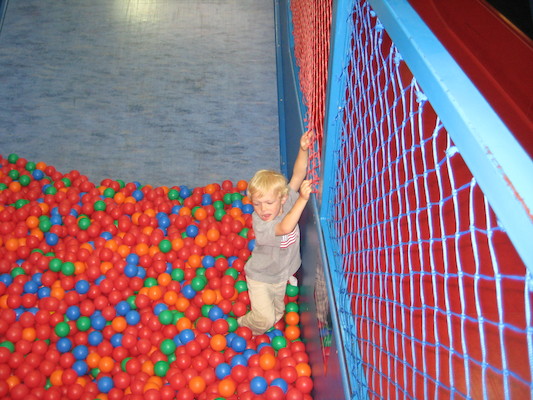 Cole in the ball pit, post slide (07-11-2009 11:00)
