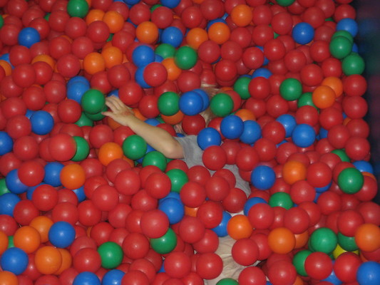 Cole in the ball pit, post slide (07-11-2009 11:01)