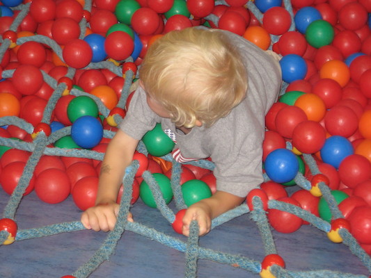 Cole in the ball pit, post slide (07-11-2009 11:01)